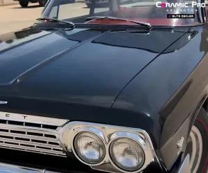 highlighting a flawless mirror-like paint finish and deep reflections, as seen in paint correction