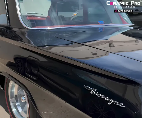highlighting a flawless mirror-like paint finish and deep reflections, as seen in paint correction
